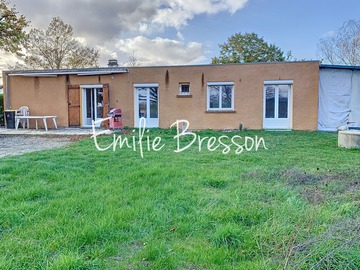 MAISON ANNEE 70 TOIT PLAT AVEC JOLI TERRAIN